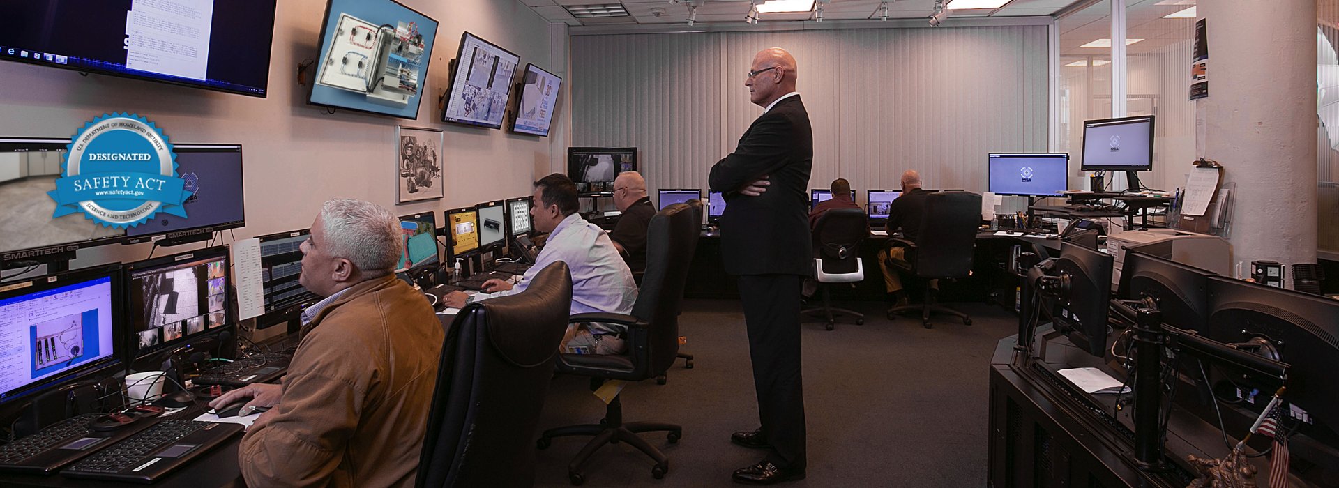 analyst team looking at SmartTech scans in the emergency operations center