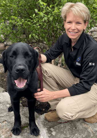 MSA Explosive Detection Canine Handler and black Labrador 