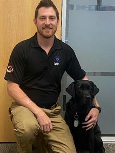 MSA explosive detection canine handler Bryan Murray and is canine partner, Lena