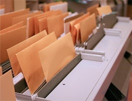 document envelopes being sorted at a mail facility 
